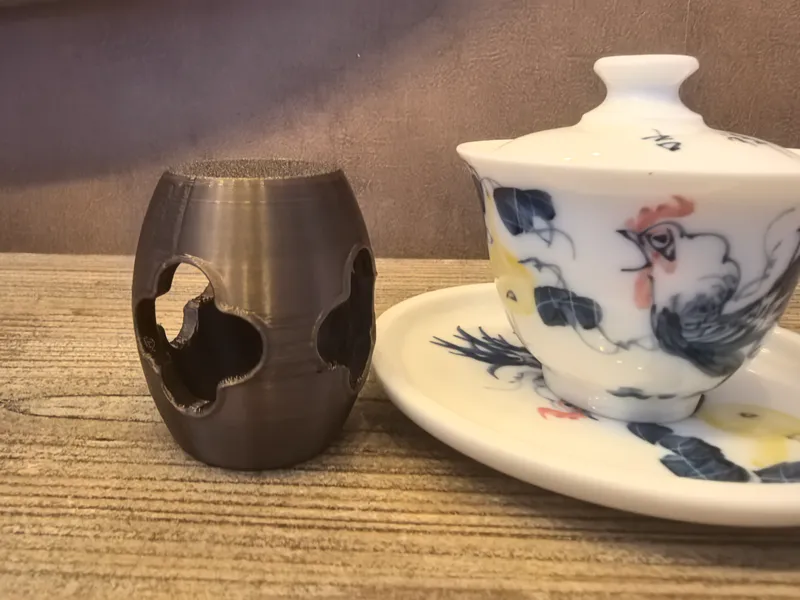 鼓型镂空梅花盖置