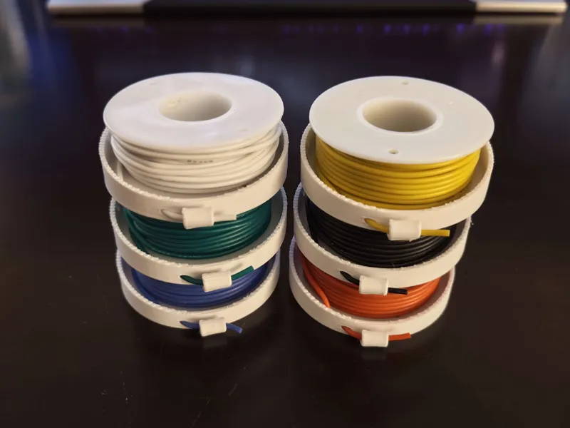 Cable spool holder with cableclip