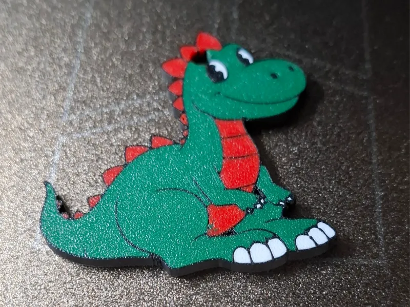 Lustiger Dinosaurier als Schlüsselanhänger