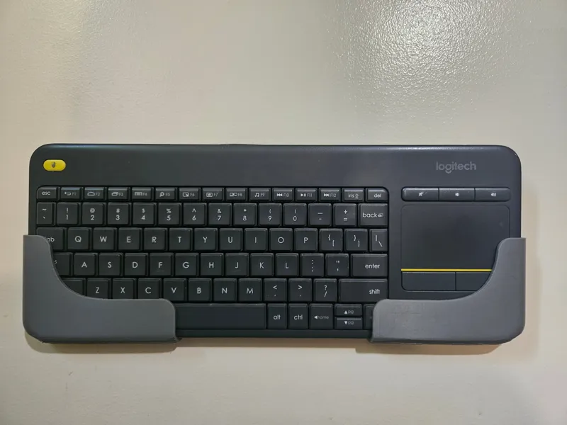 Wall mounted holder for Logitech K400 keyboard