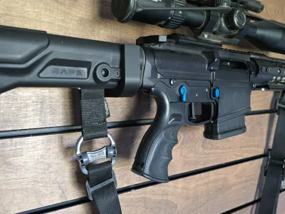 AR10 holder for slatwall 