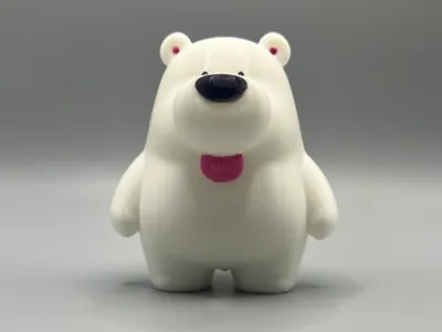 A polar bear sticking out its tongue