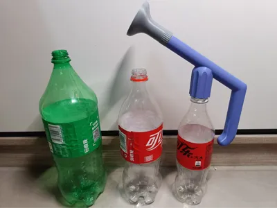Sprite and Coca-Cola bottle sprinkler garden watering kit