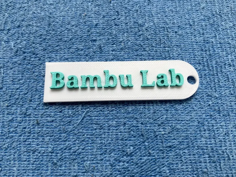 Keychain with the inscription Bambu Lab