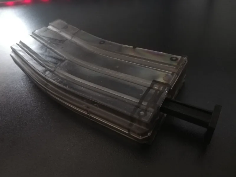 Airsoft speedloader pusher