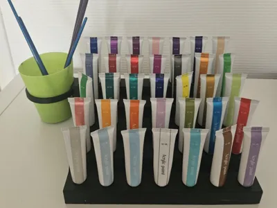 Paint tube base