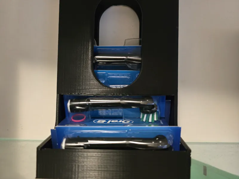 Toothbrush head holder