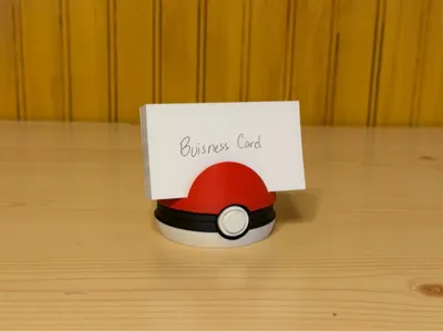 Pokeball buisness card stand and/or phone stand