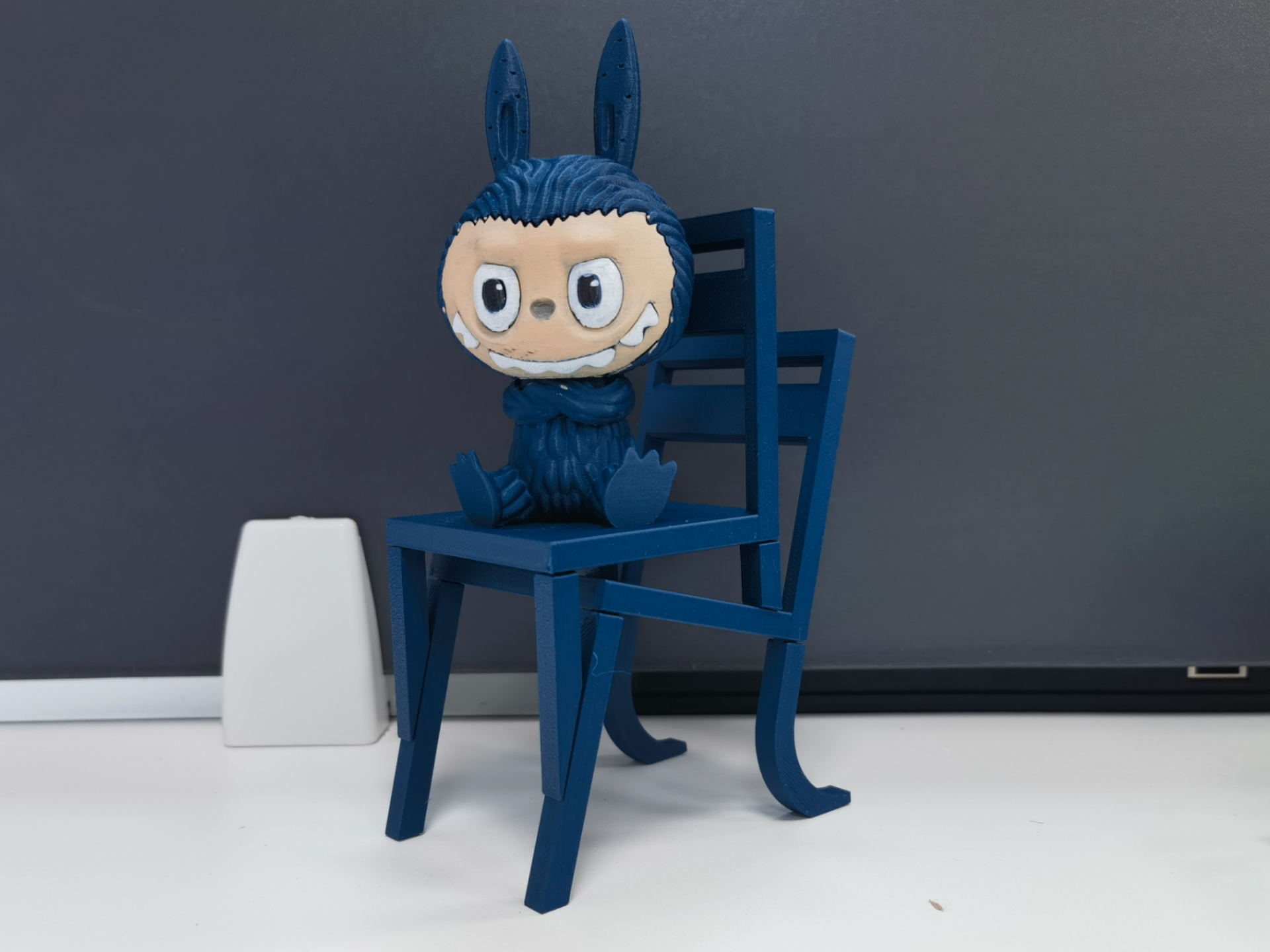 Please be seated, miniature alien-inspired chair with backrest by One 1 ...