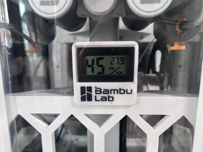 enclosure thermometer holder