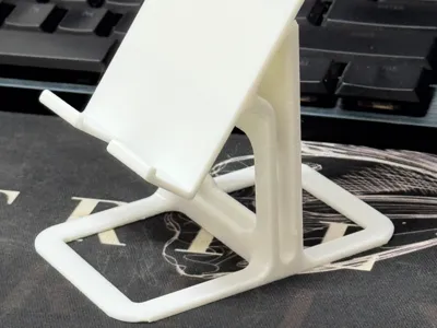 Phone Holder (with reserved charging cable port)