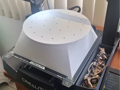 Cover to dry filaments using the printer's hot bed