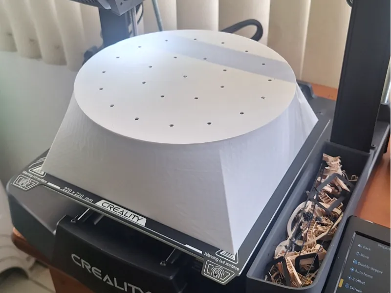 Cover to dry filaments using the printer's hot bed