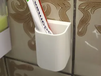 Tooth paste holder