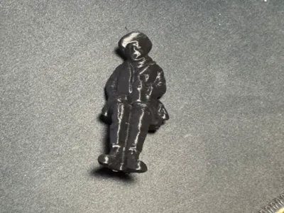 Figure with bottle 