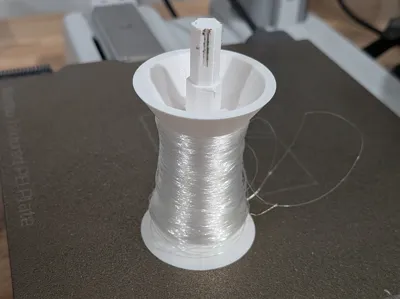 Fishing reel spool unwinder for power drill
