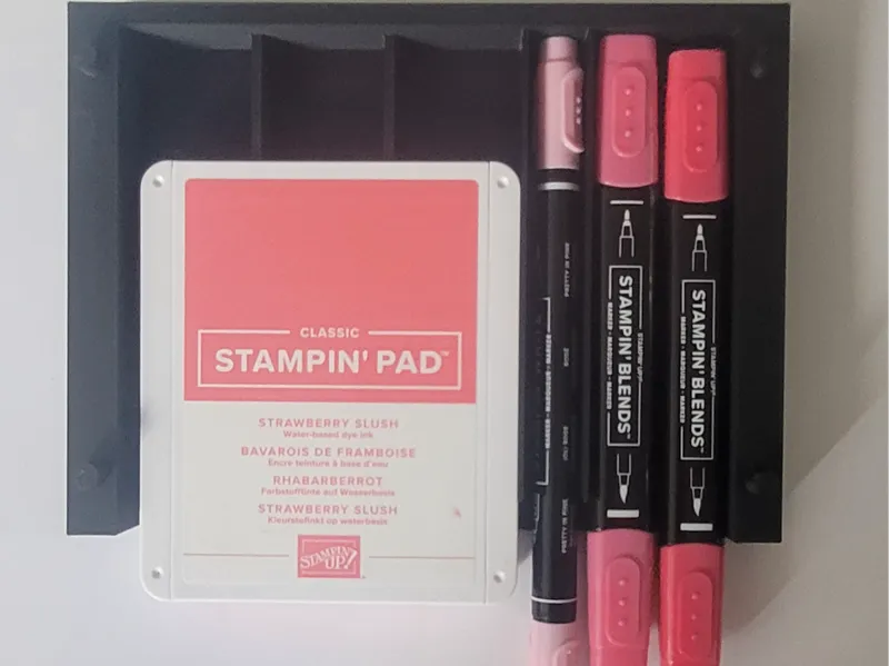 Holds old and new SU ink pads and shimmer brushes