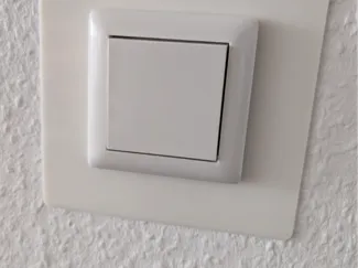 Lichtschalterrahmen Taptenschutz