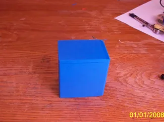 small box, 2.5 cm [1 inch] by 3.5 cm [1.4 inch]