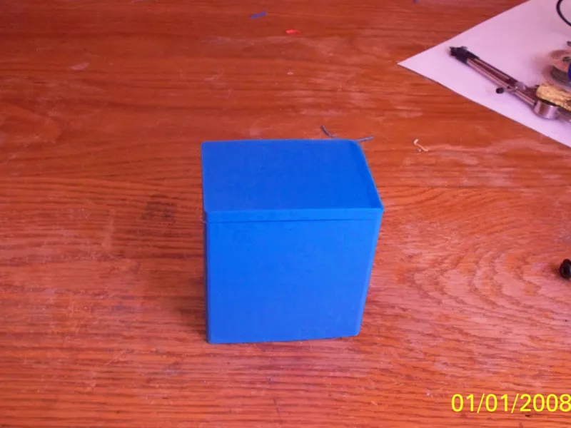 small box, 2.5 cm [1 inch] by 3.5 cm [1.4 inch]