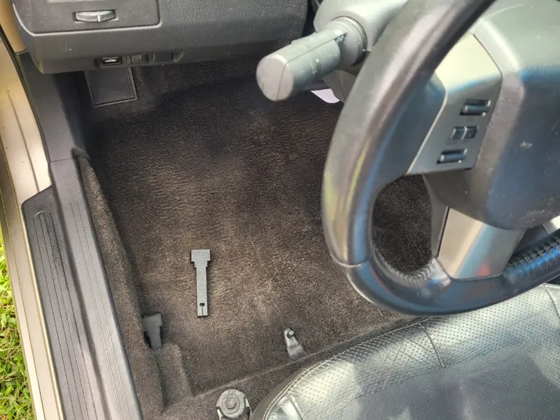 02-06 Nissan Altima fuel tank lid lever