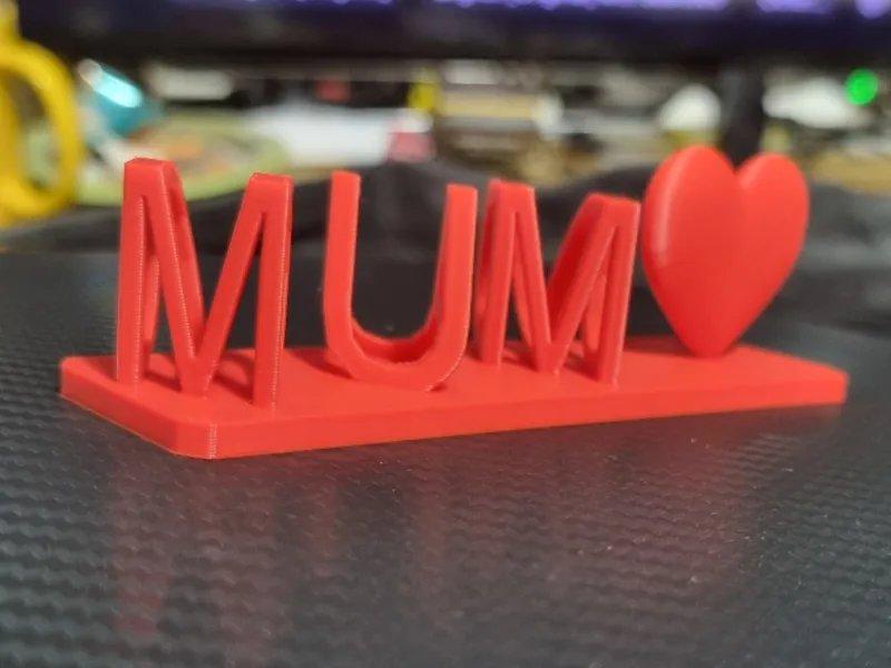 Mum and dad ilusion text with heart figure
