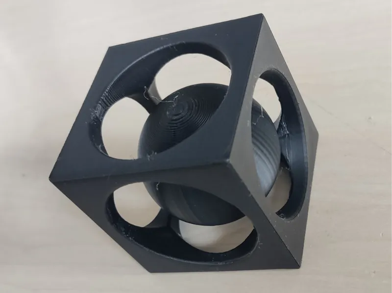 Trapped ball in cube