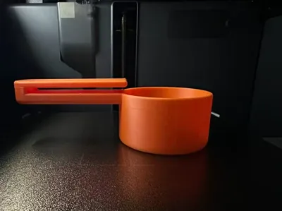 Pet food scoop with bag clip