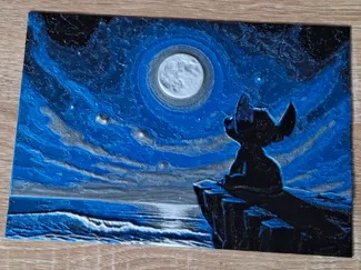 Stitch regardant la lune