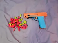 S.I.M.P. - blaster jouet à élastique à chargeur interne — photo 1