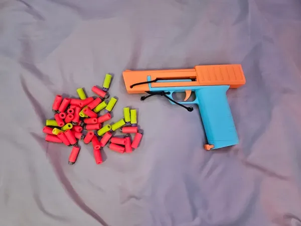 S.I.M.P. - blaster jouet à élastique à chargeur interne