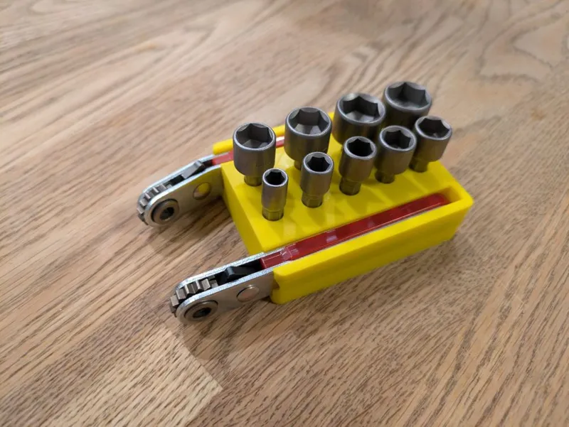 Holder for 2 mini wrenches and 9 x sockets set
