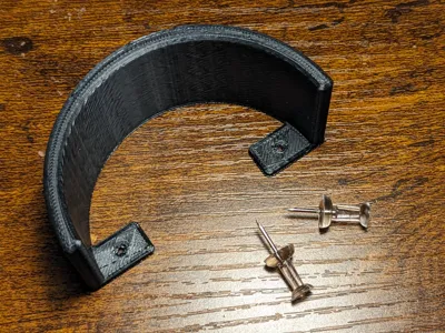 Duct tape holder for bulletin board