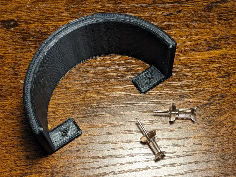 Duct tape holder for bulletin board
