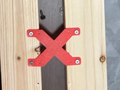 X-shaped wood board connector