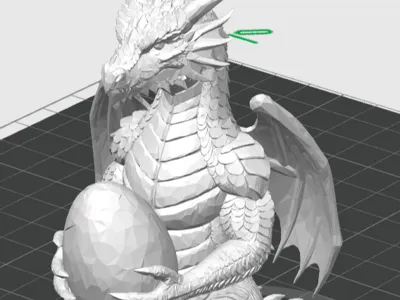 dragon figure holding an egg
