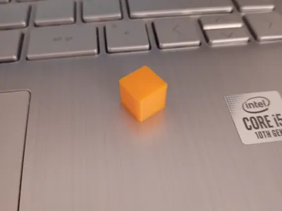 Test cube with raised letter