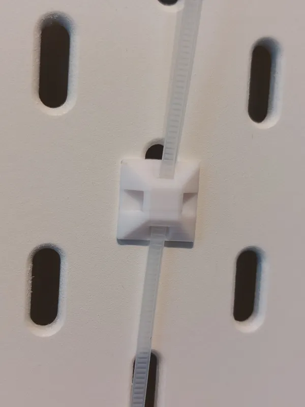 Zip tie base for skadis