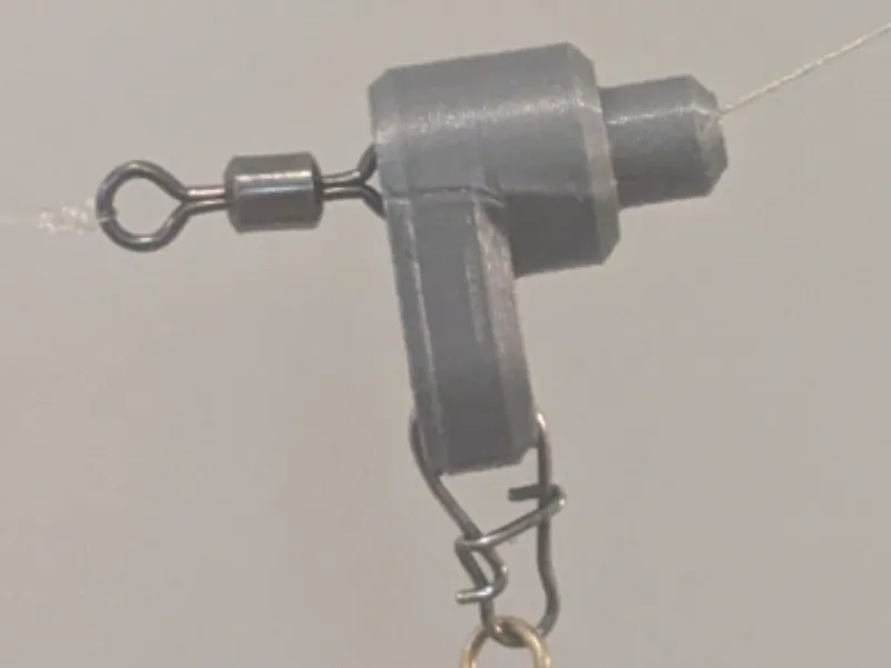 Sliding weight swivel catch