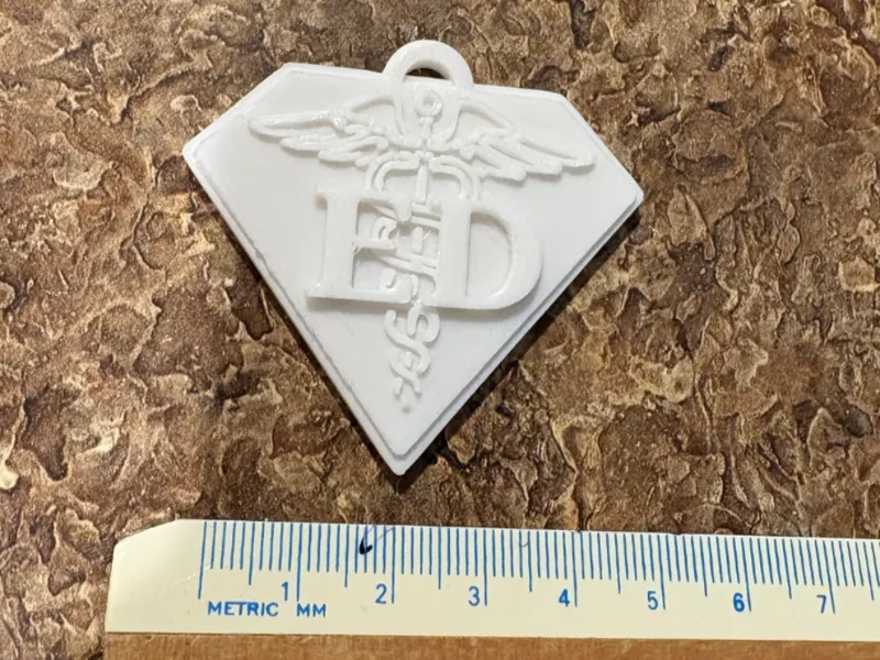 ED/RN/PCA keychain with caduceus background