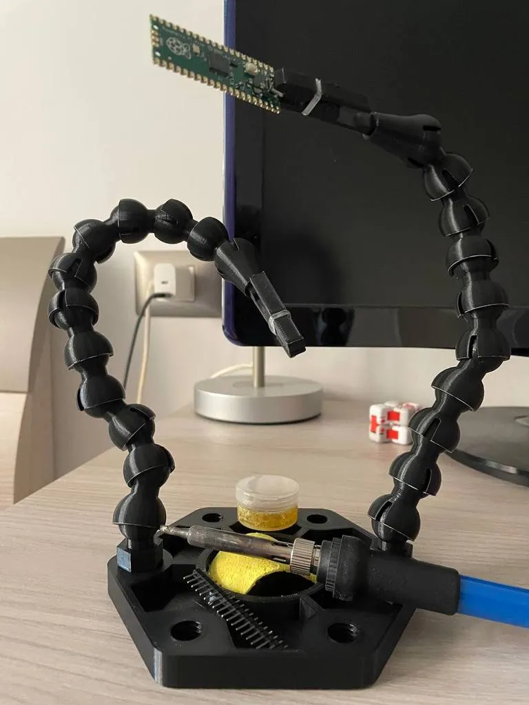 Soldering station with flexible brackets