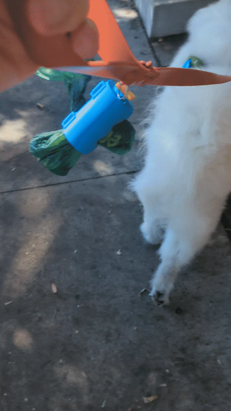 Your dog can pull you into the bushes all they want - the dispenser won't drop their poop!