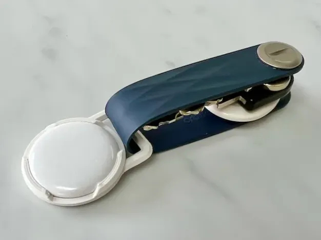 AirTag snap-in holder