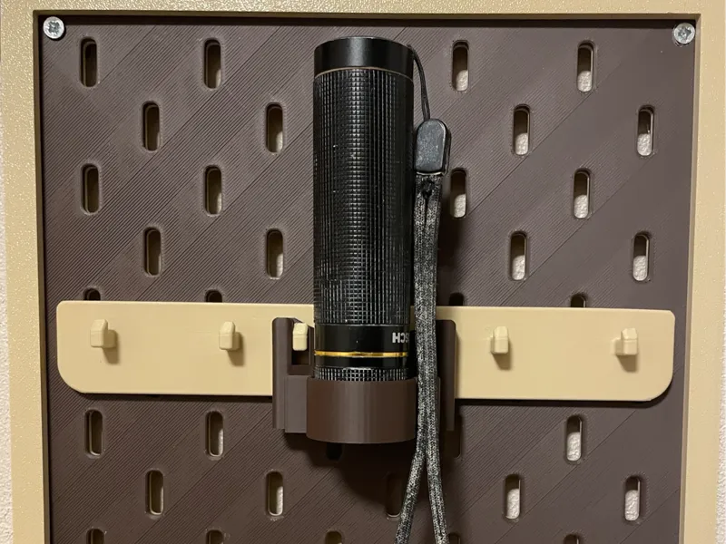 Skadis flash light holder