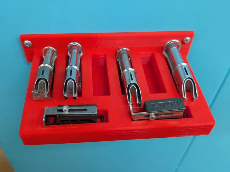 Sewing machine binders wall holder