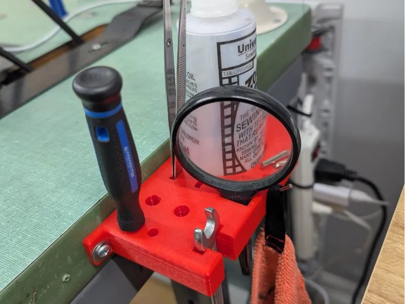 Tool holder for sewing machine table side