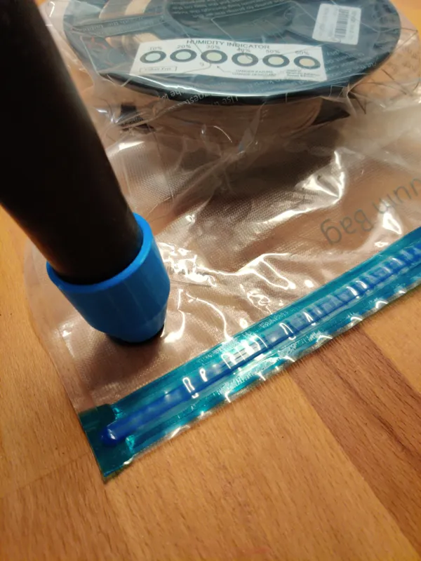 Hose adapter for filament vacuum bag