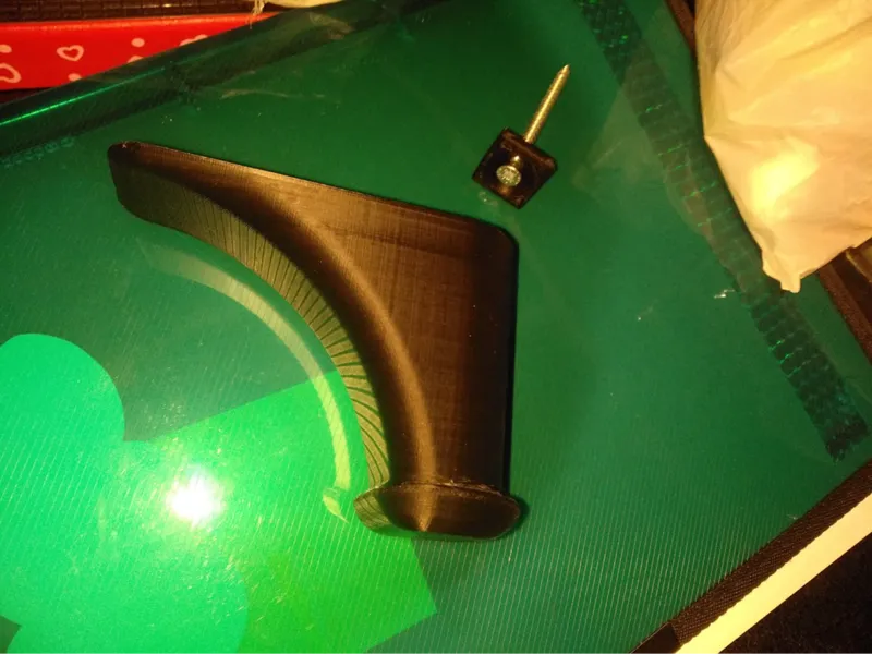 Soporte pared para auriculares.  