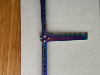 Butterfly Knife with Comb Blade