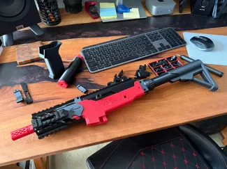 stock with adjustment holes